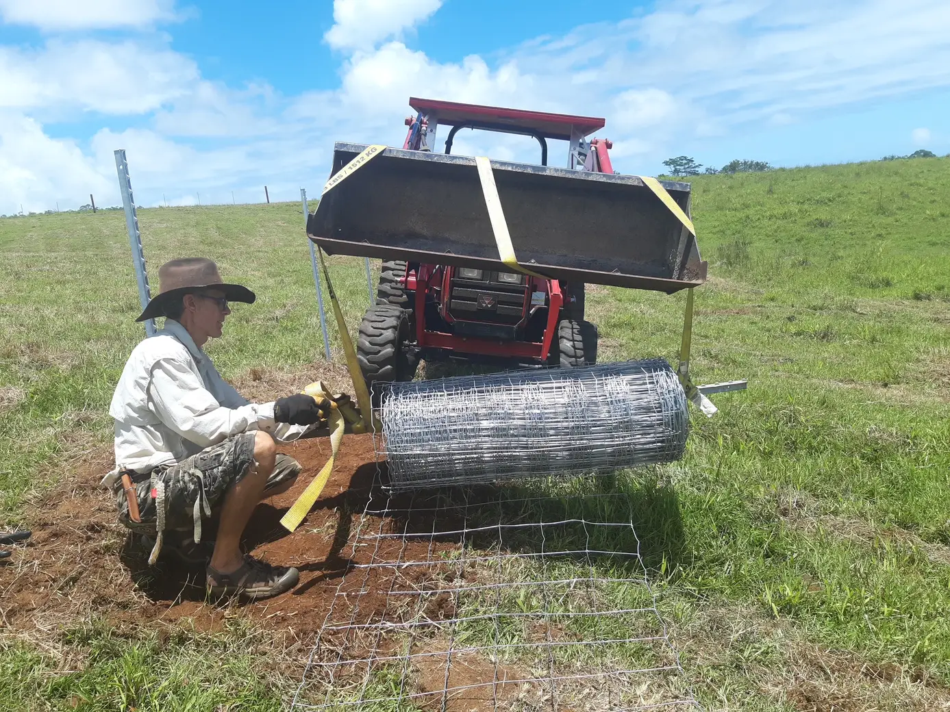 Mau maintaining ranch equipment
